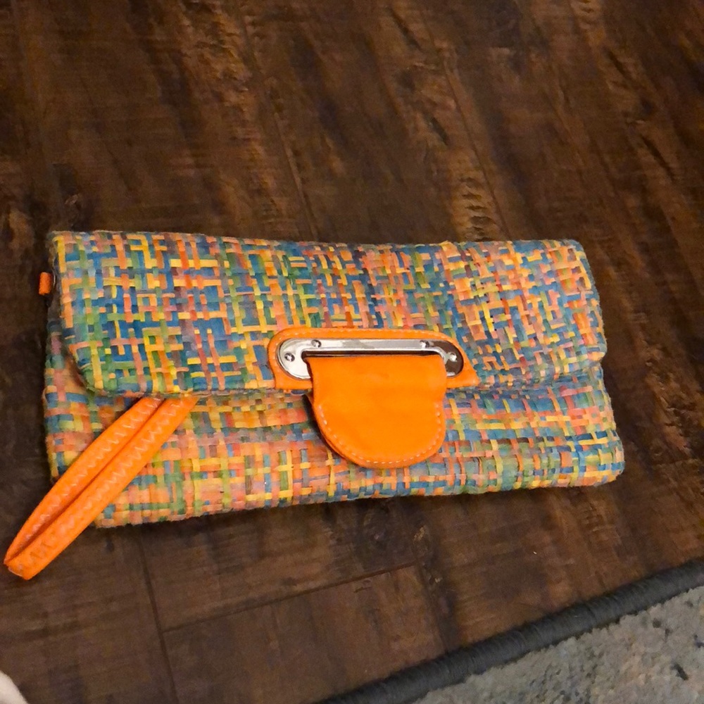 Orange woven clutch